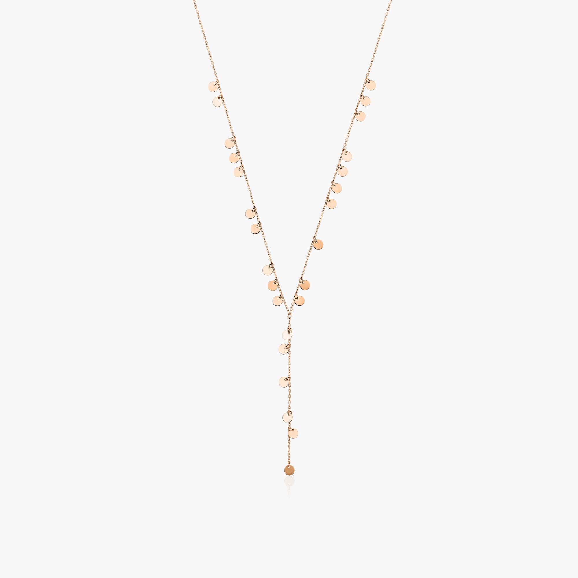 A 14K rose gold lariat necklace featuring a series of round discs strung on a fine chain, with a yellow gold finish.