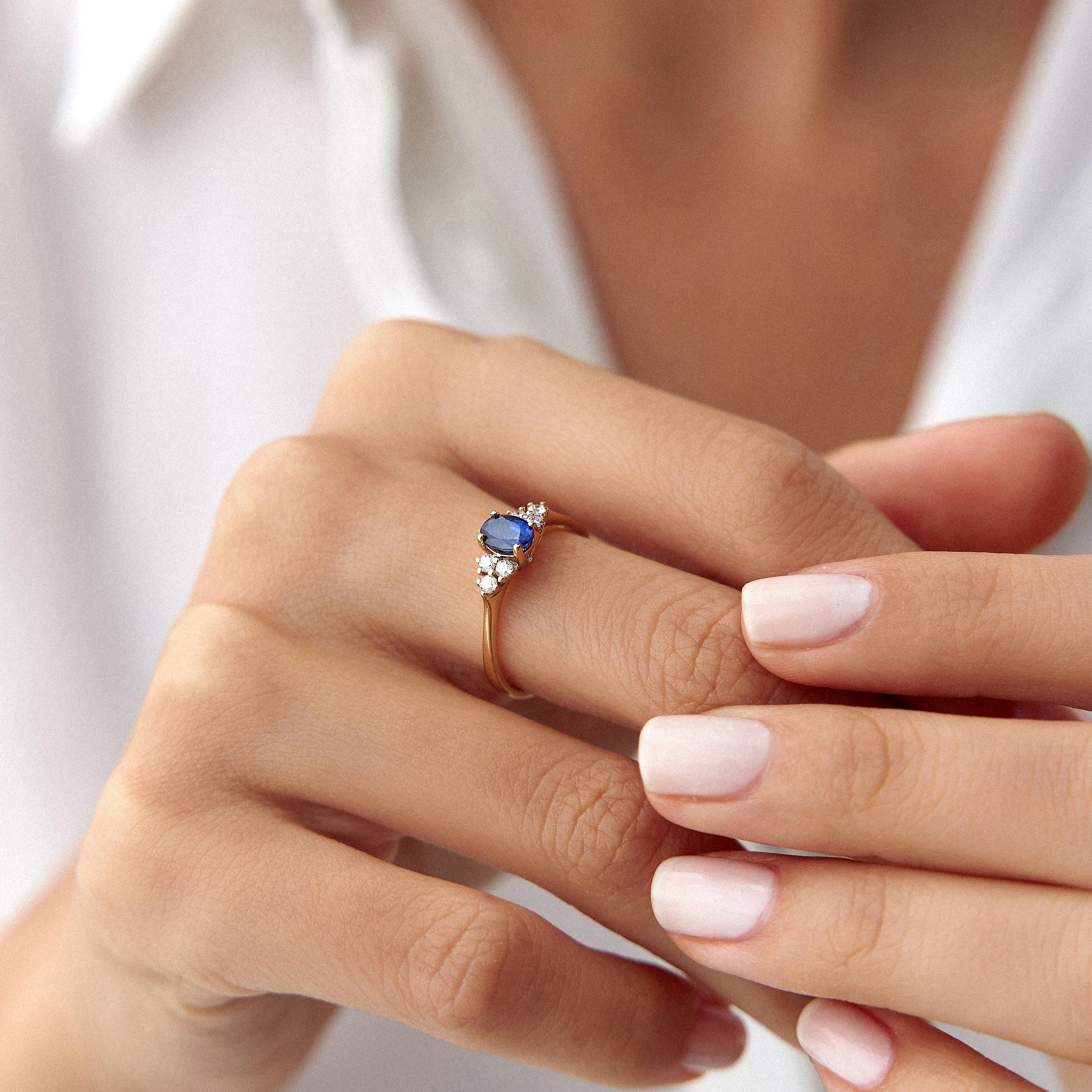 Oval Sapphire and Diamond Ring in 14K Gold