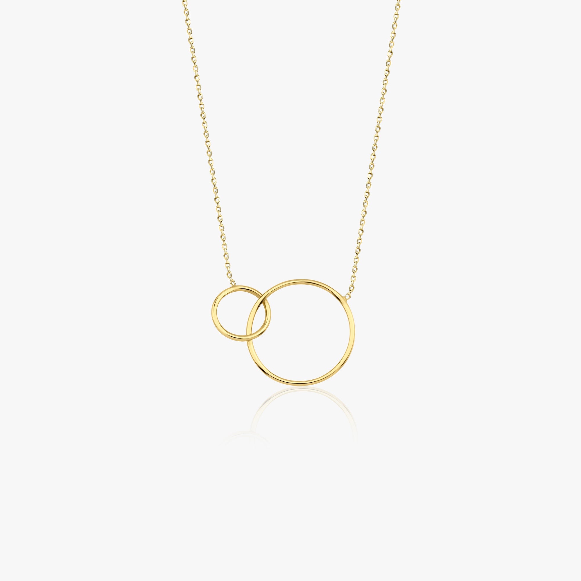 A 14k solid gold necklace featuring two interlocking circles with a larger circle diameter and a smaller circle diameter, on a white background.