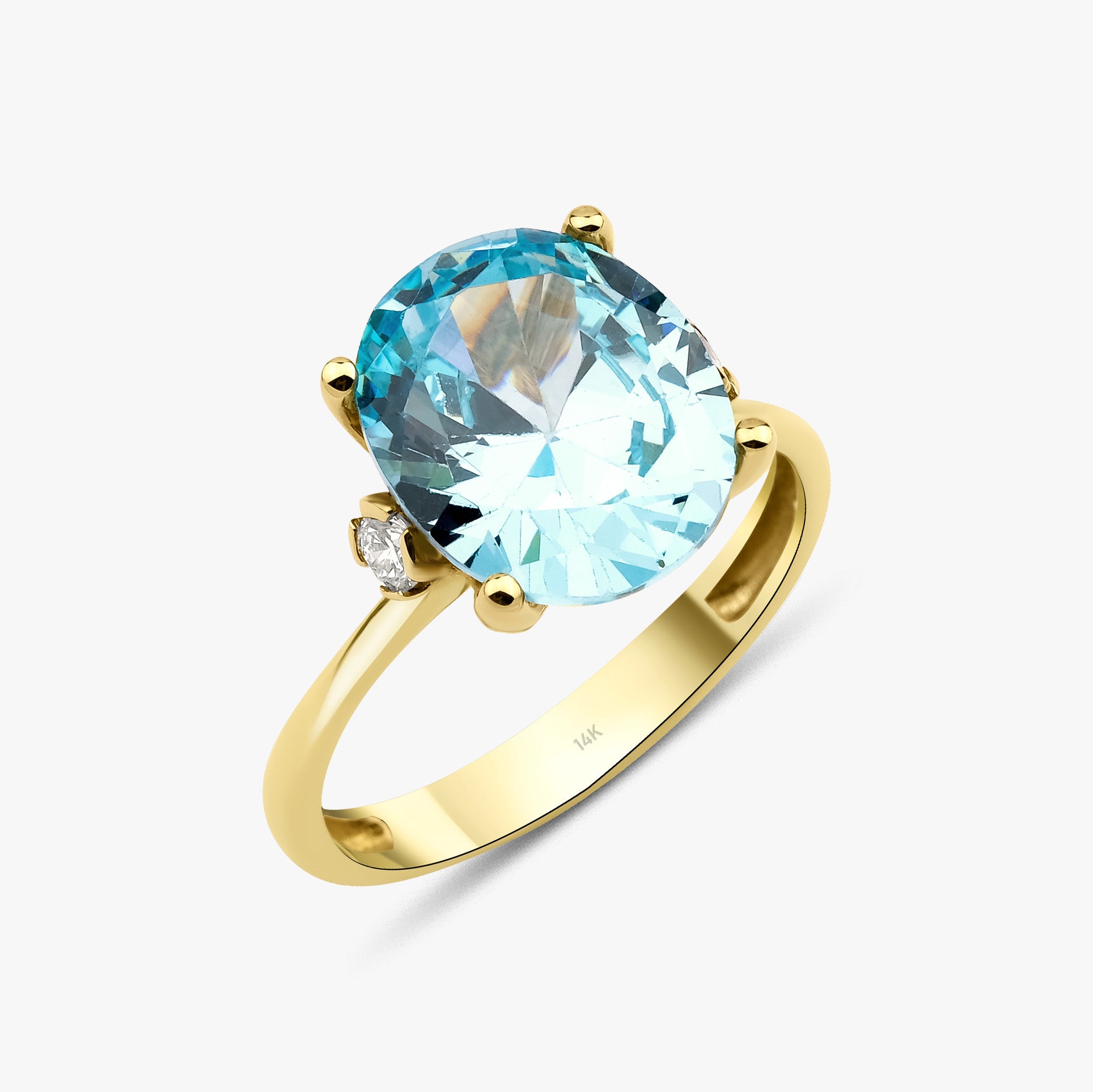 Oval Cut Blue Zirconia and Diamond Cocktail Ring in 14K Gold