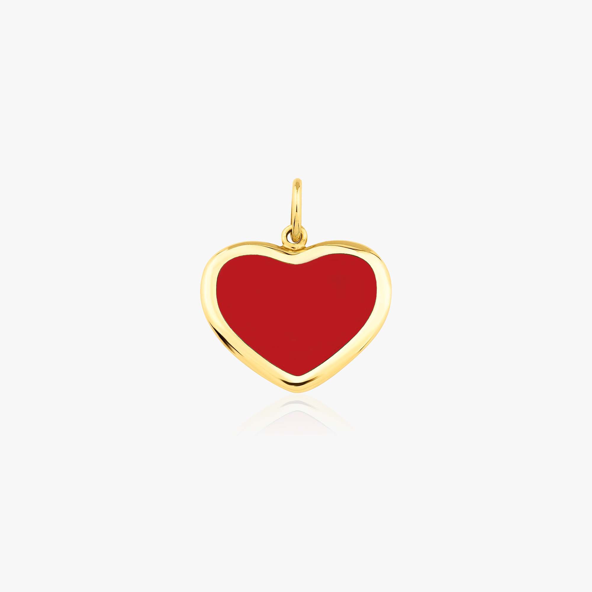 A 14k yellow gold large heart-shaped pendant with red enamel on a white background
