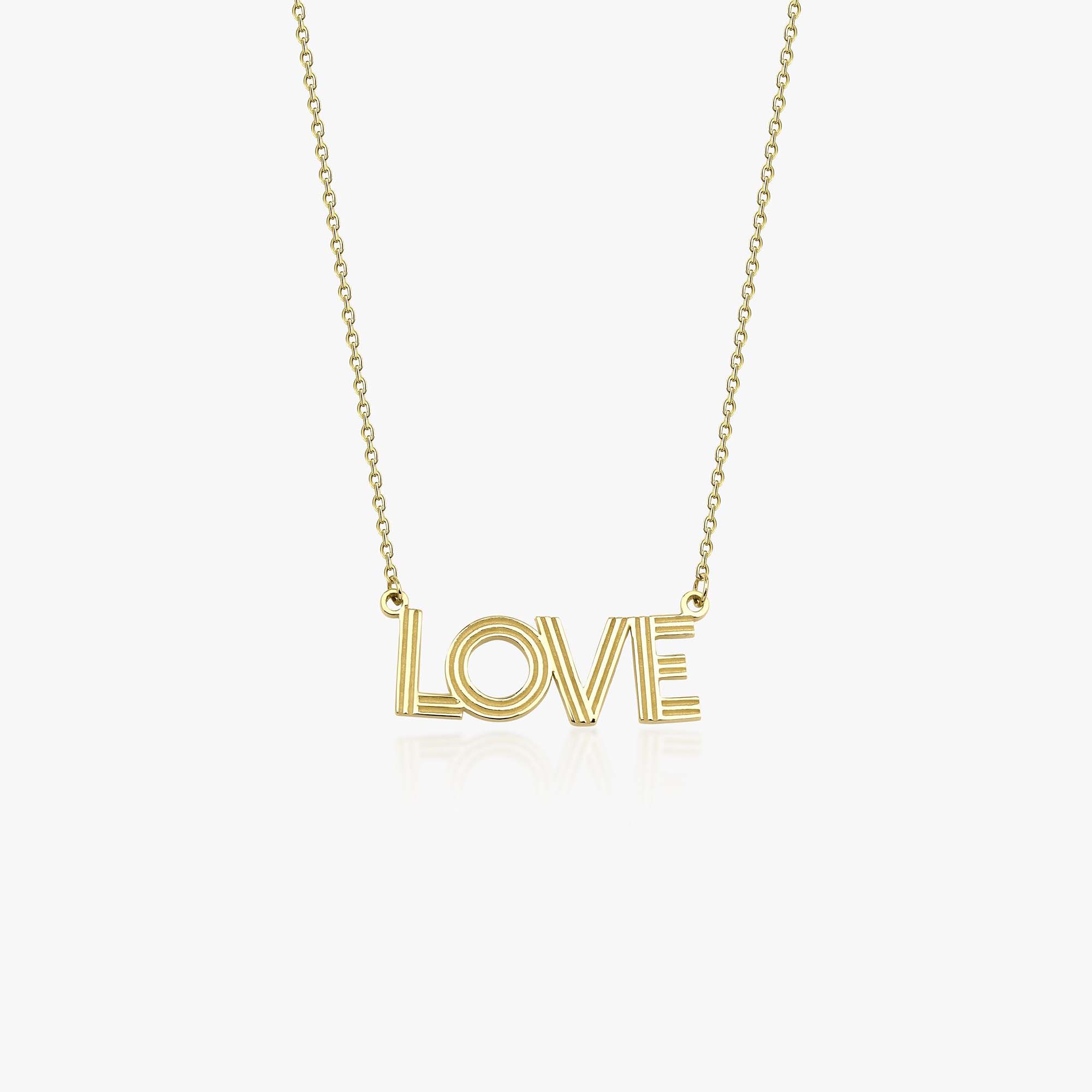 14k yellow gold love script necklace shown on a white background