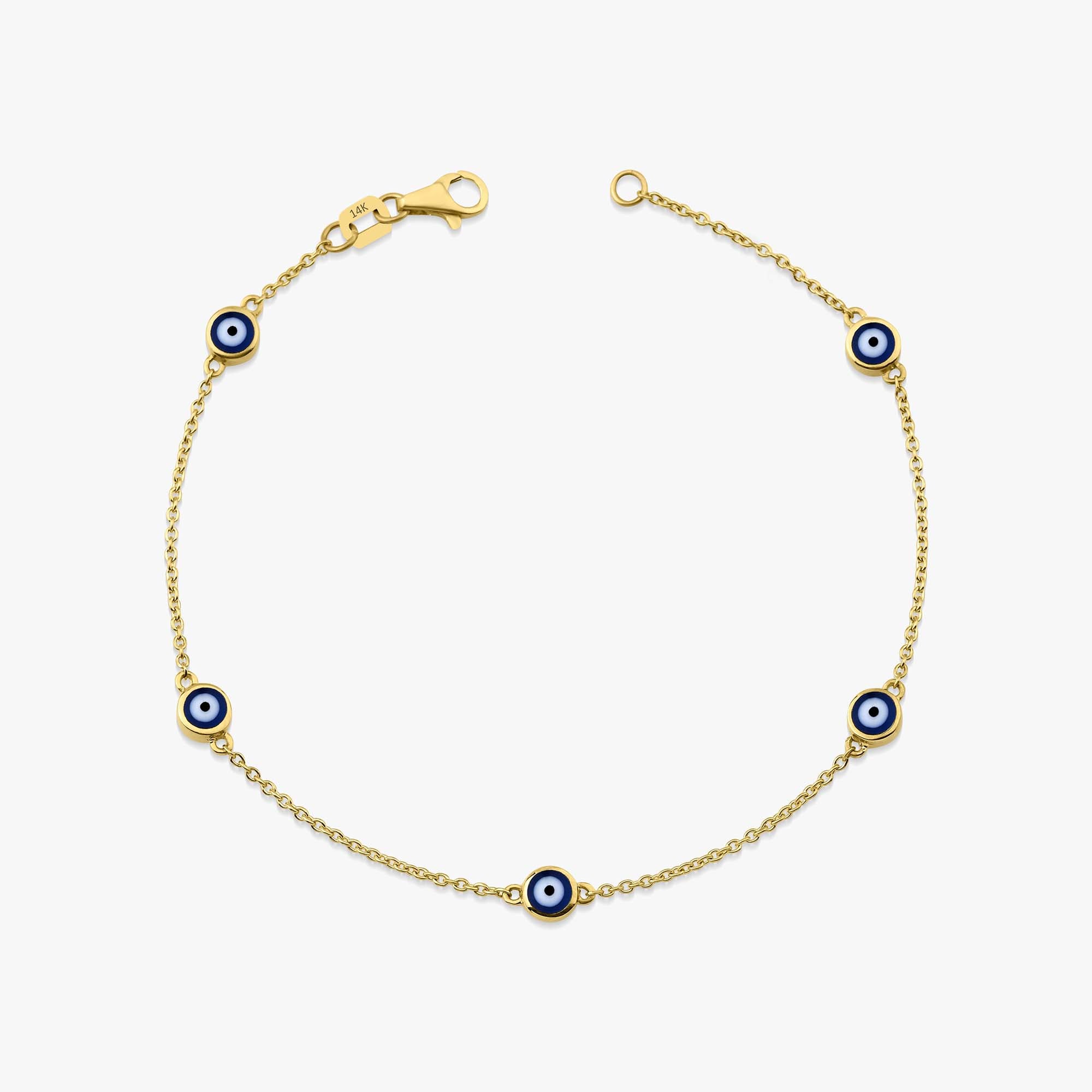 14k yellow gold navy blue evil eye bracelet with 5 evil eyes shown on a white background