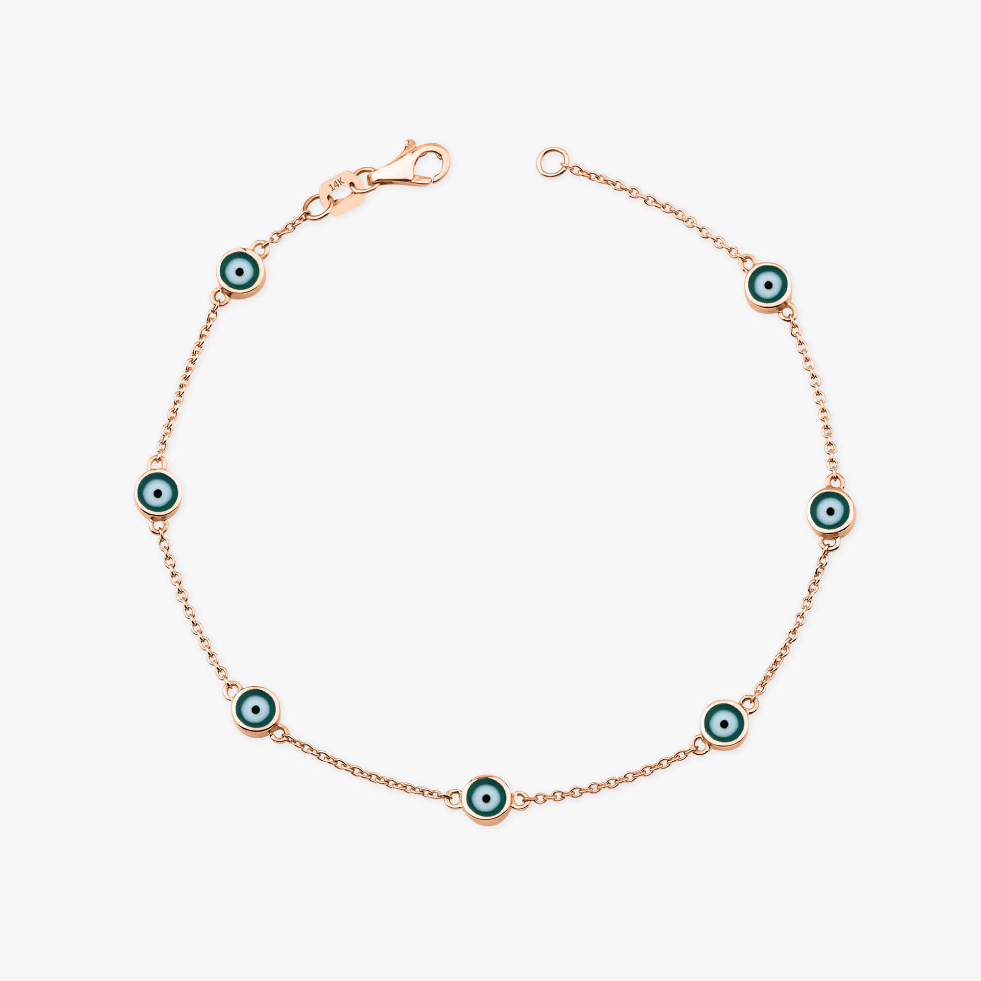14k rose gold evil eye bracelet with 7 green evil eyes shown on a white background