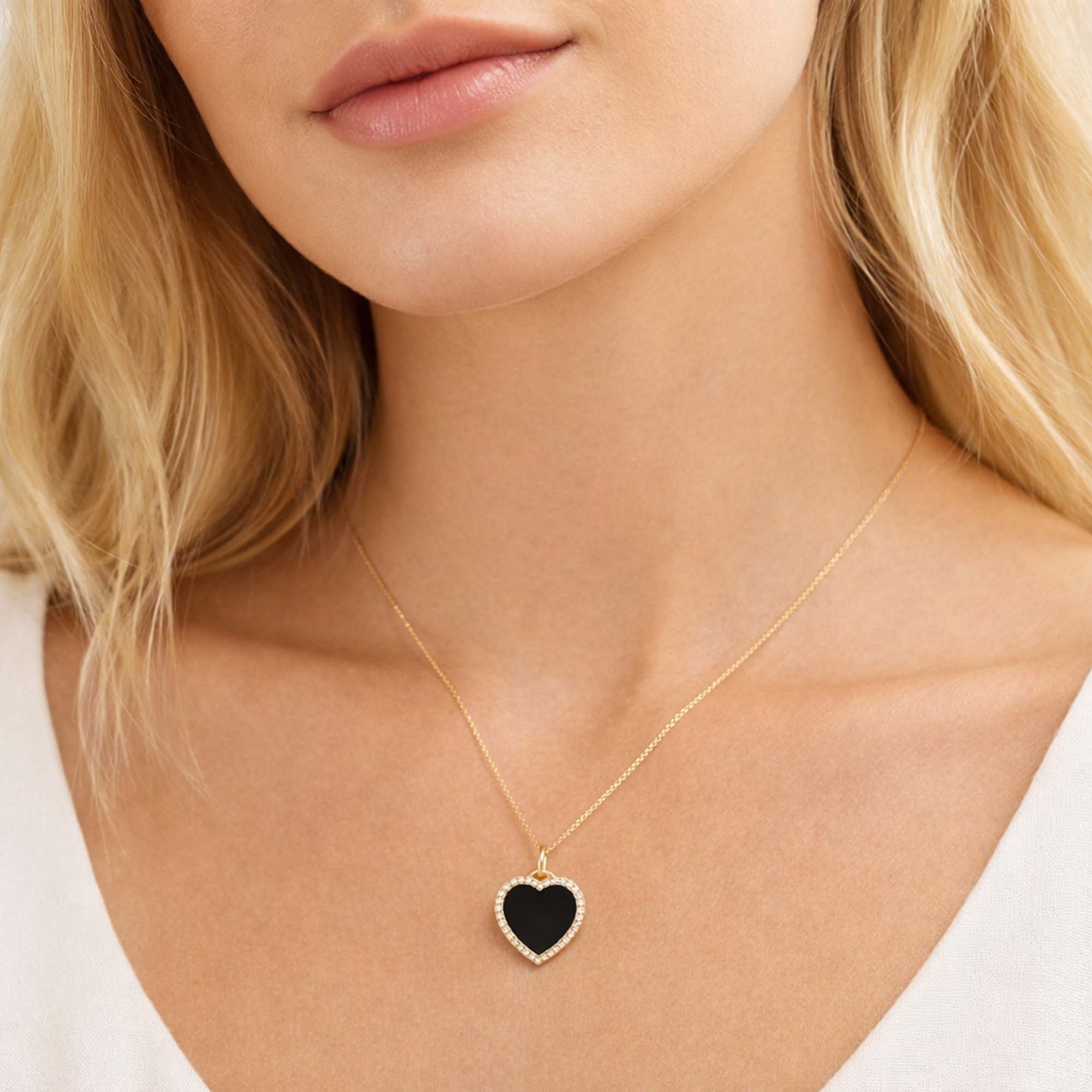 Small Diamond Onyx Heart Pendant in 14K Gold