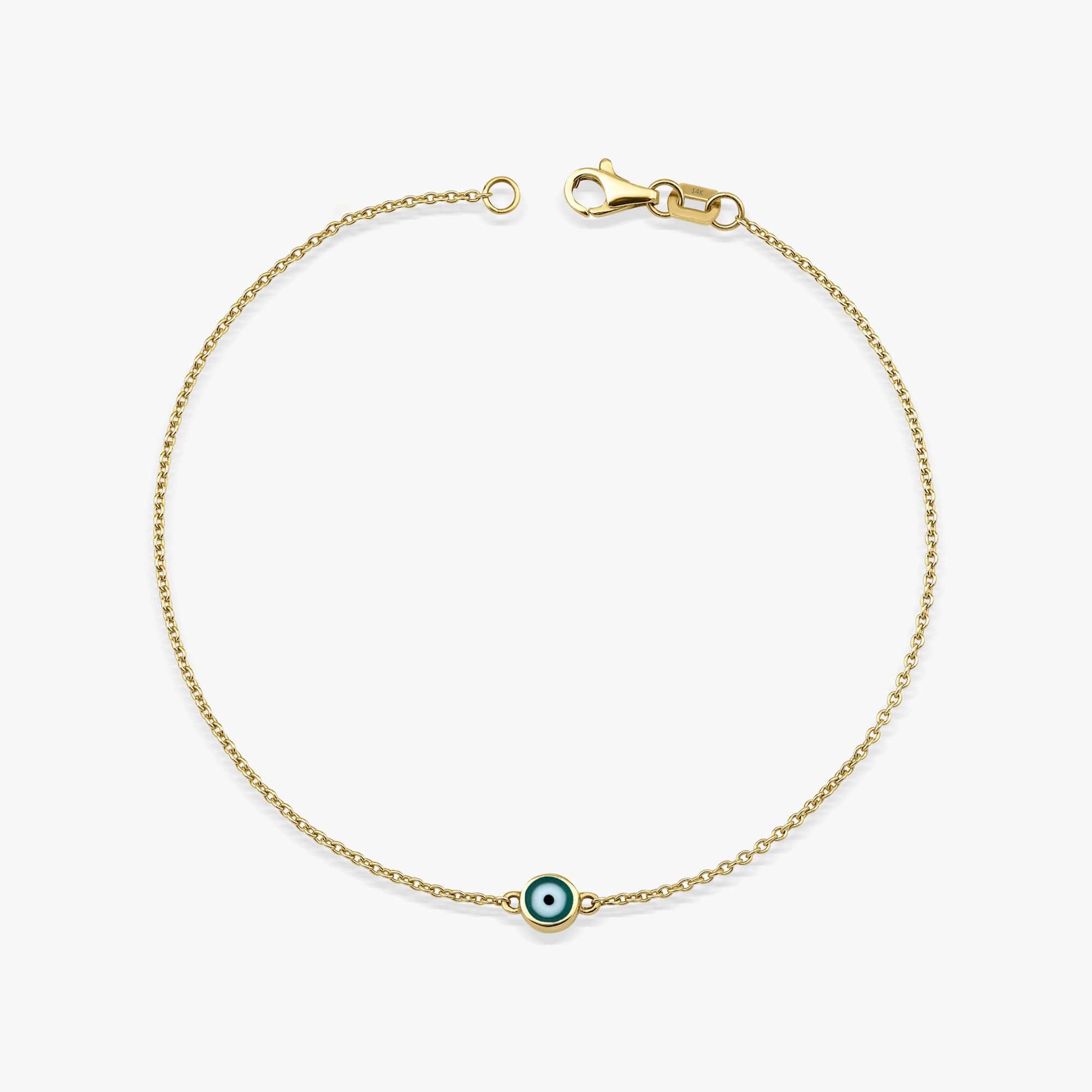 14K yellow Gold bracelet with a small green evil eye charm on a white background