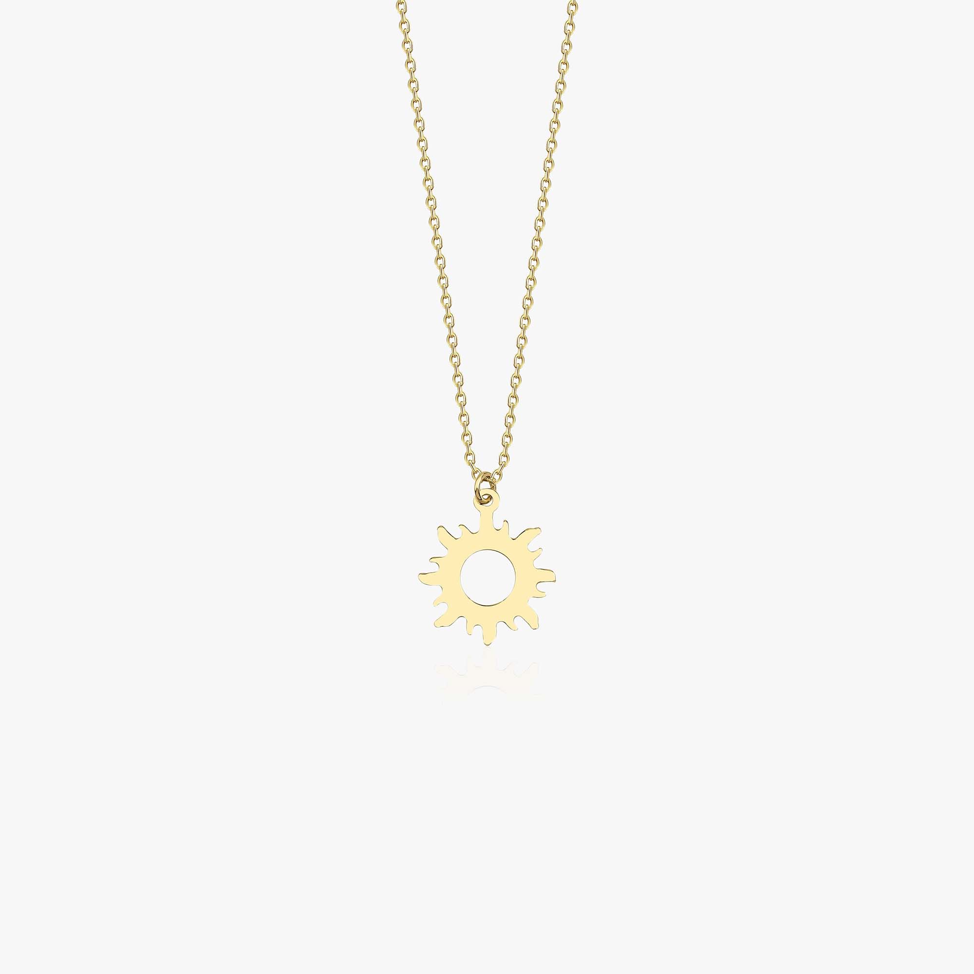 A 14K gold necklace with a simple sun pendant design shown on a white background.