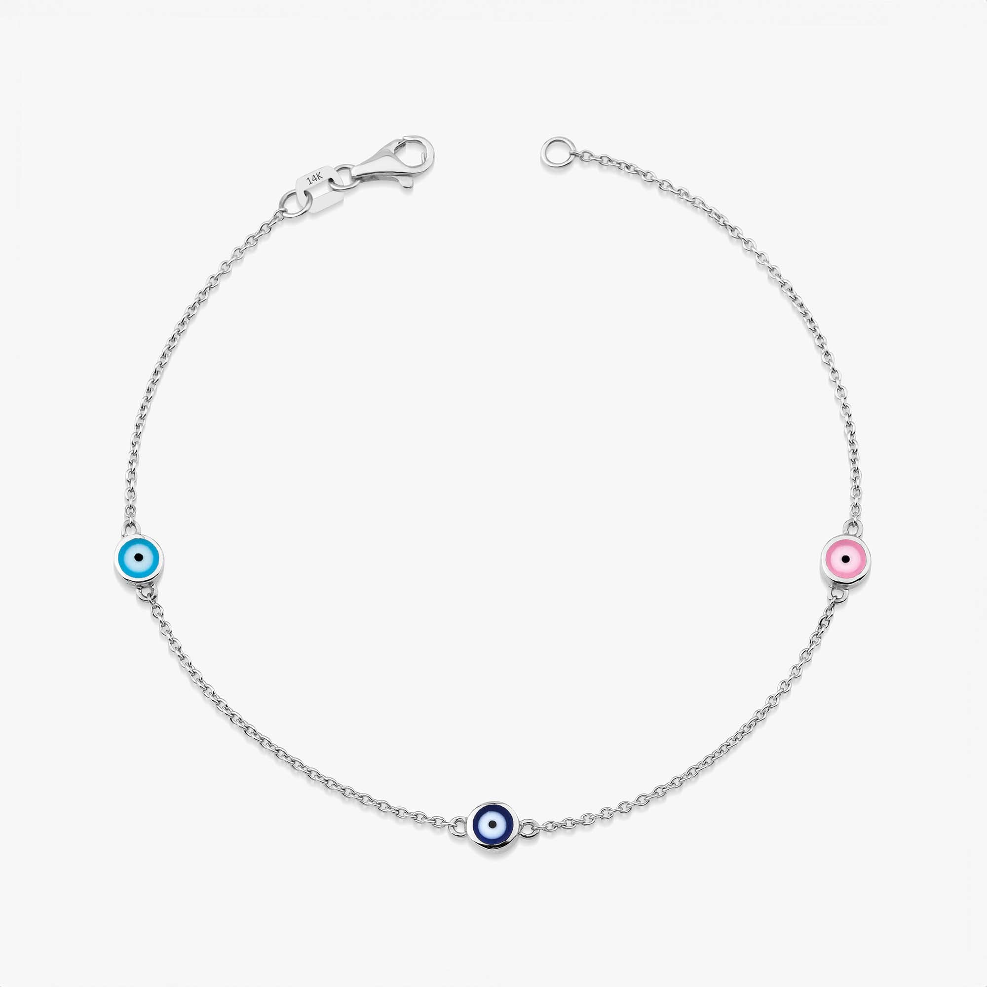 14 karat white gold multicolor evil eye bracelet with three evil eyes on a white background