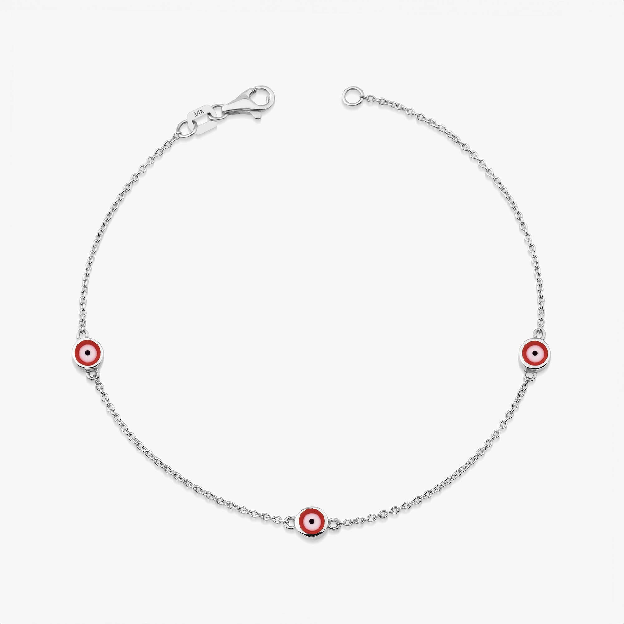 14 karat white gold three red evil eye bracelet with lobster clasp on a white background