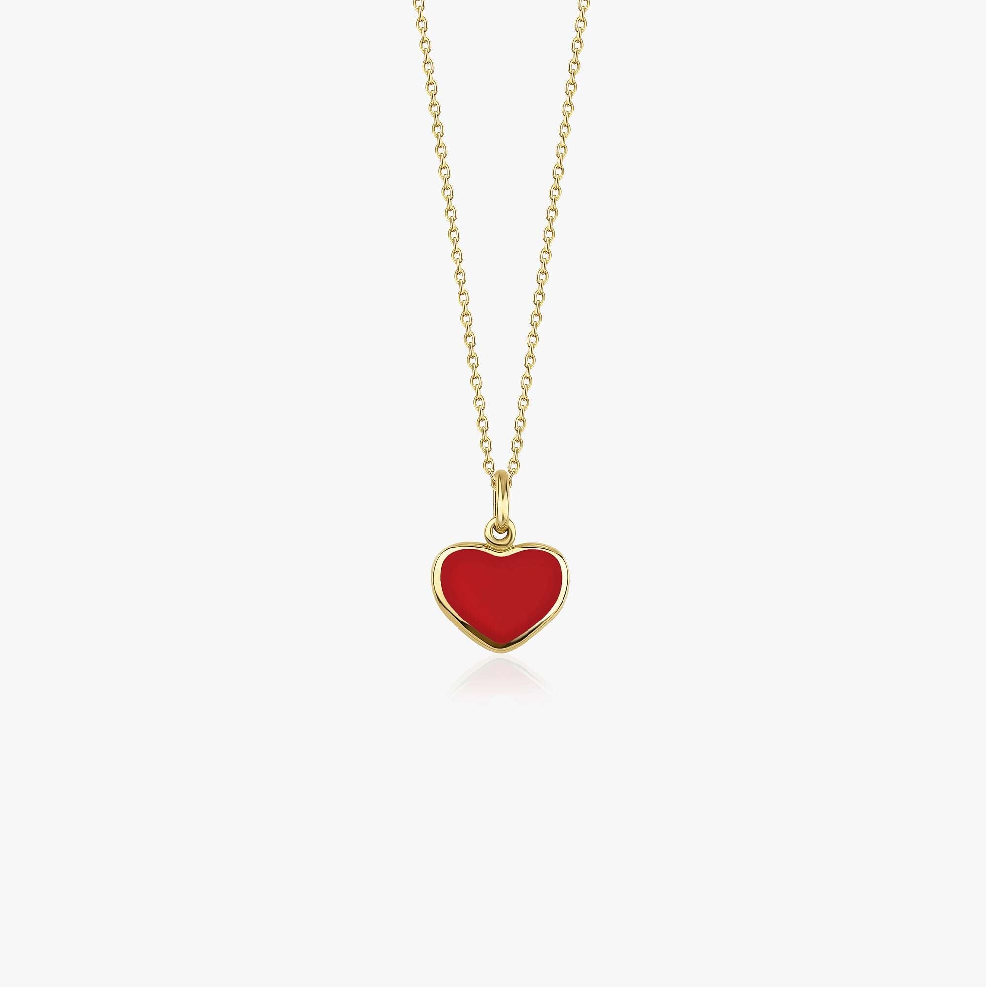 A 14k yellow gold necklace with a red heart-shaped pendant shown on a white background