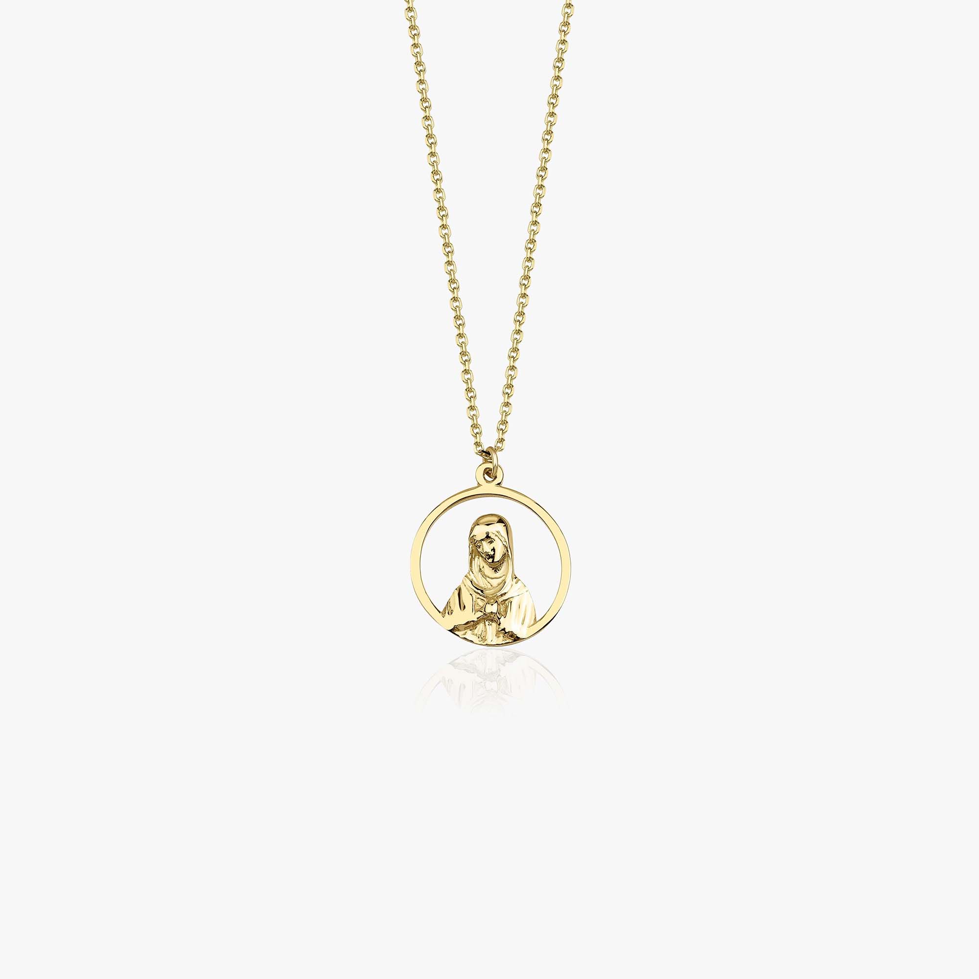 A 14k yellow gold open virgin mary necklace shown on a white background.