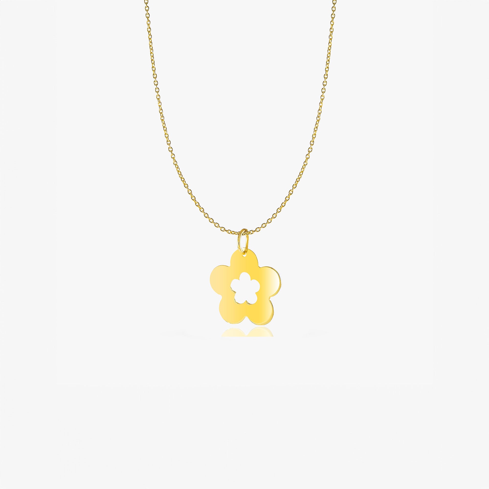 A 14k yellow gold flower necklace shown on a white background