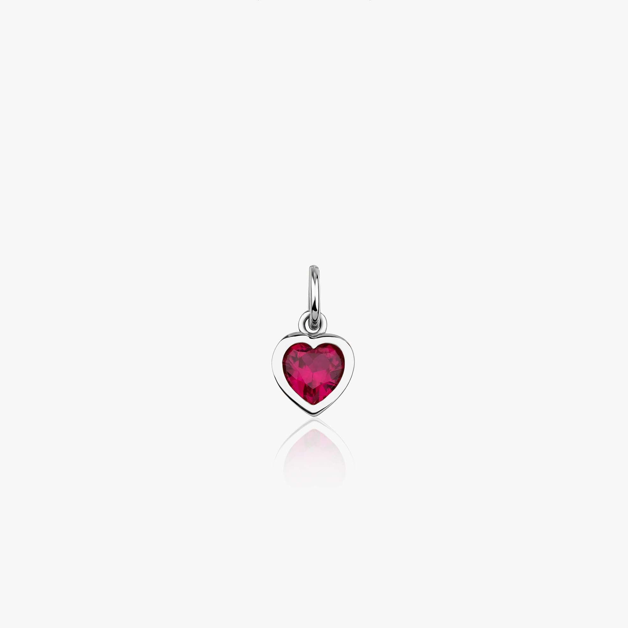 A 14K white gold heart-shaped pendant with a red gemstone in the center, on a white background.