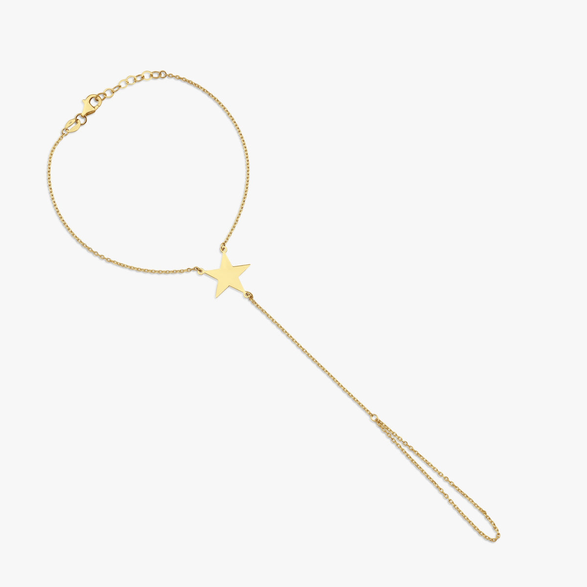 A 14K gold chain hand bracelet with a central star-shaped charm, featuring a gold chain and a small star-shaped detail on the end.
