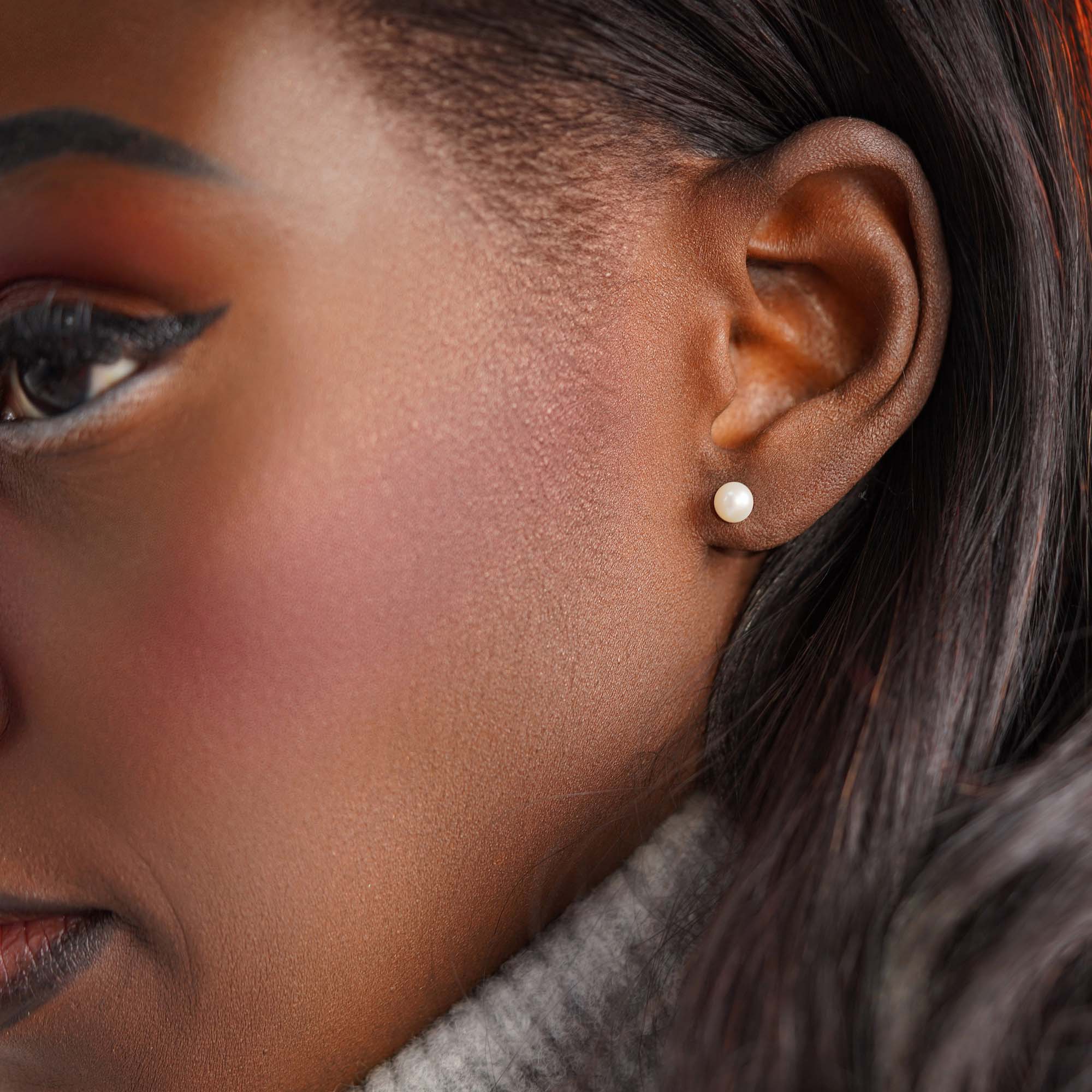 Tiny Pearl Studs in 14K Gold