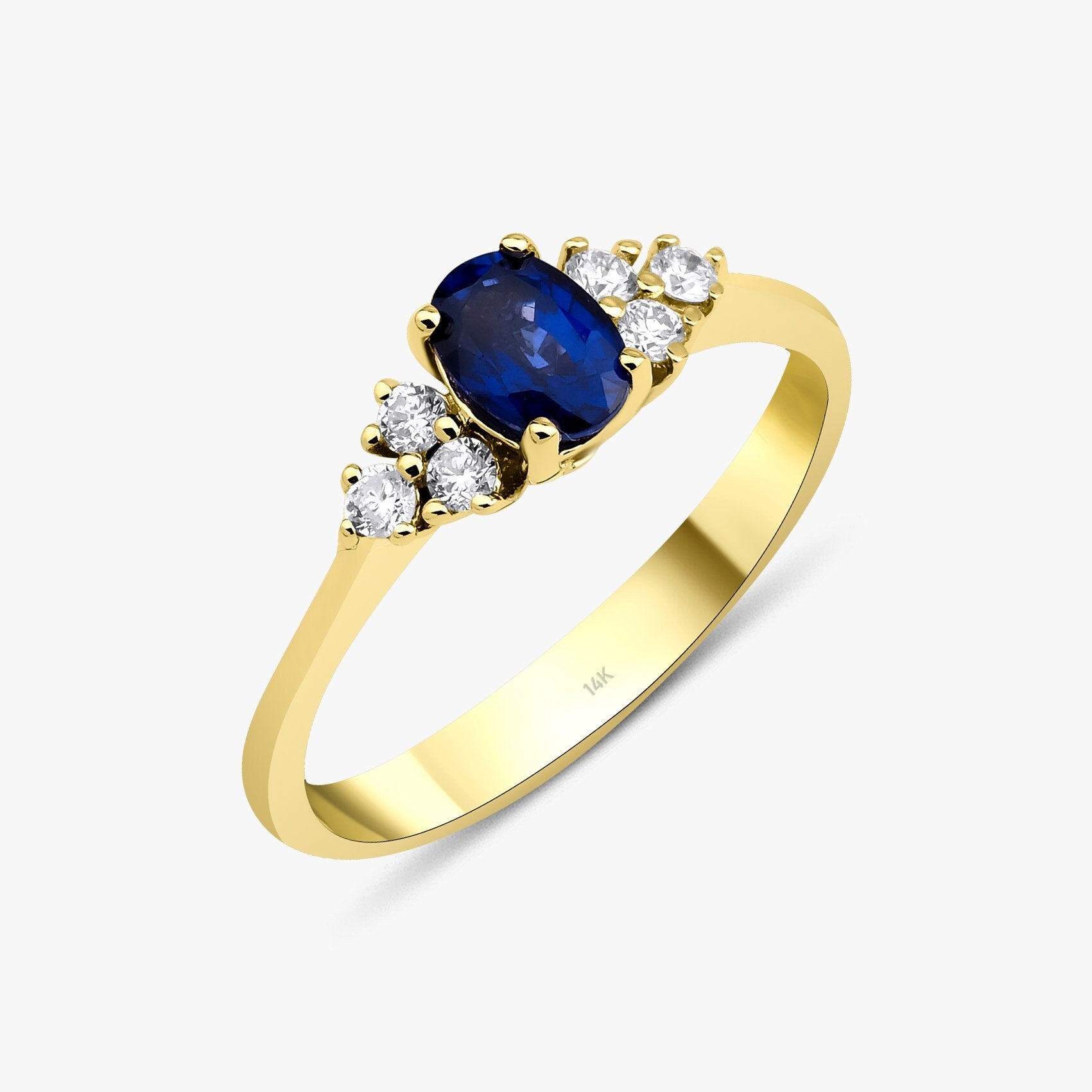 Oval Sapphire and Diamond Ring in 14K Gold