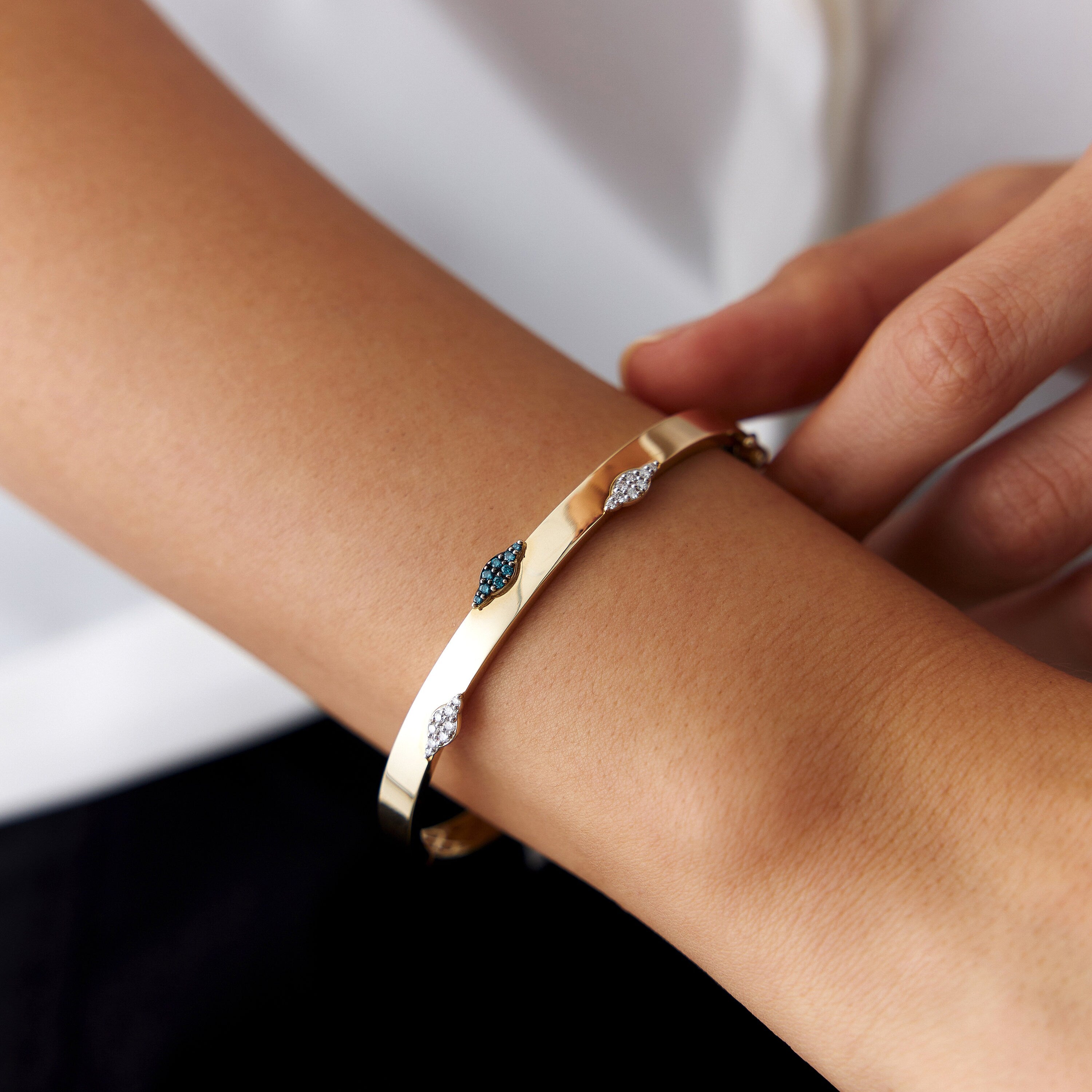 White and Blue Diamond Bangle Bracelet in 14K Gold